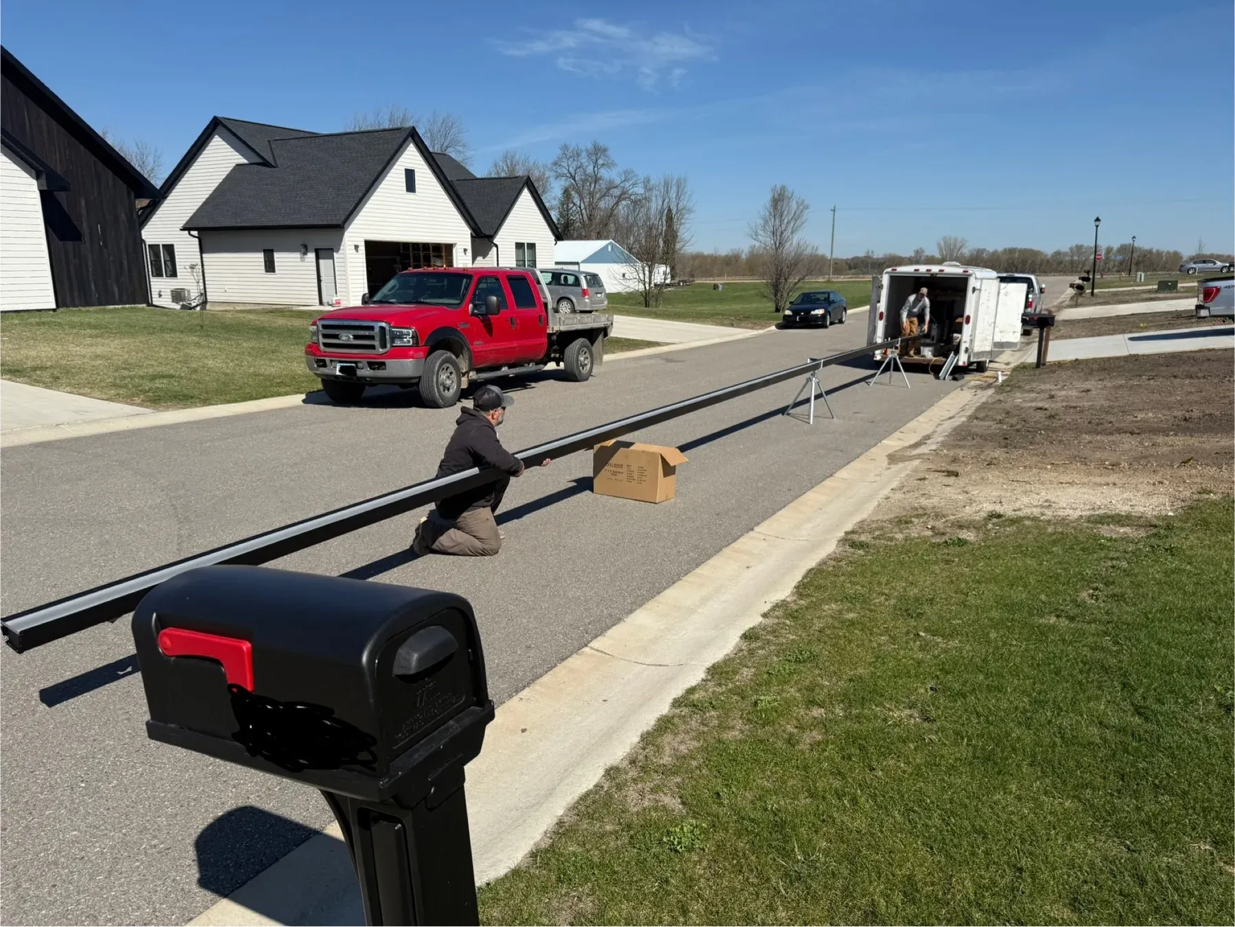 Fresh gutter run staged at a central Minnesota job site